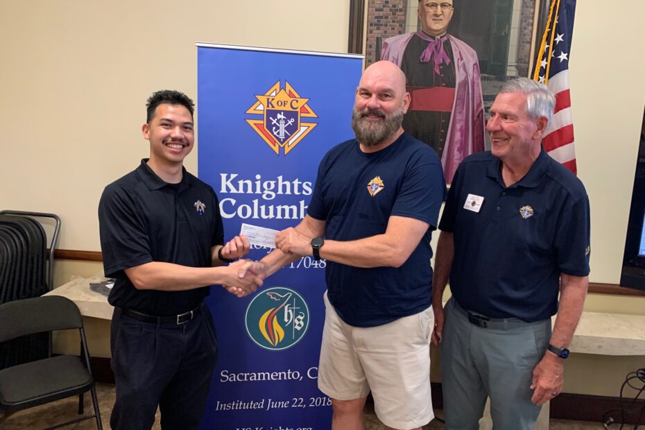 Presentation of a Check to Seminarian Stevenson Agdon