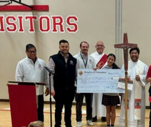 Presentation of the check to the winner of the 2025 Essay Contest